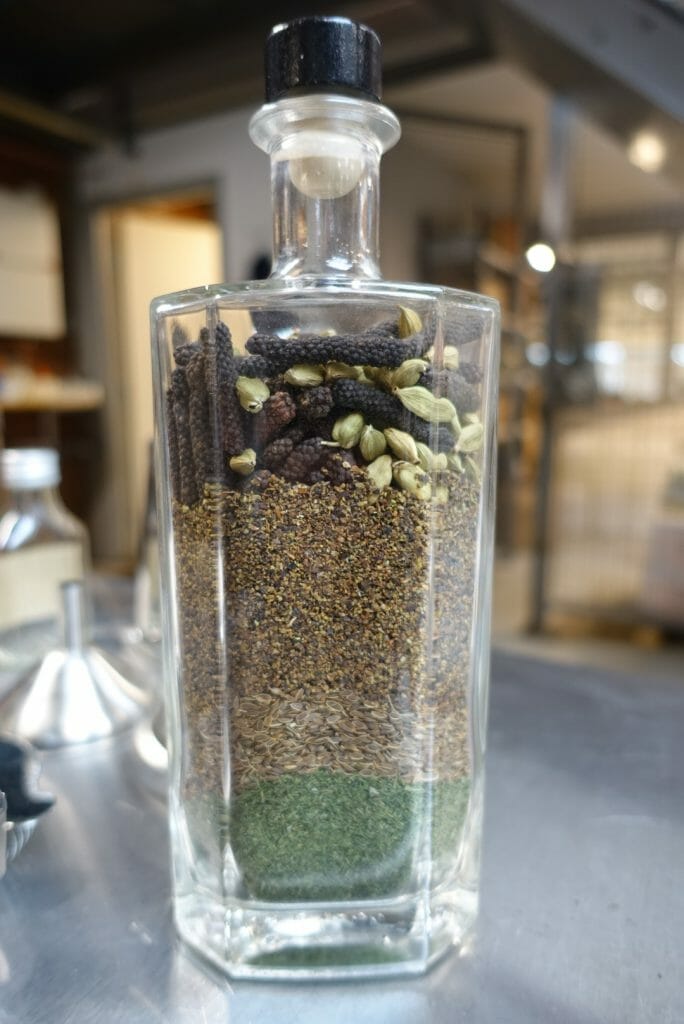 Glass bottle full of the botanicals they use