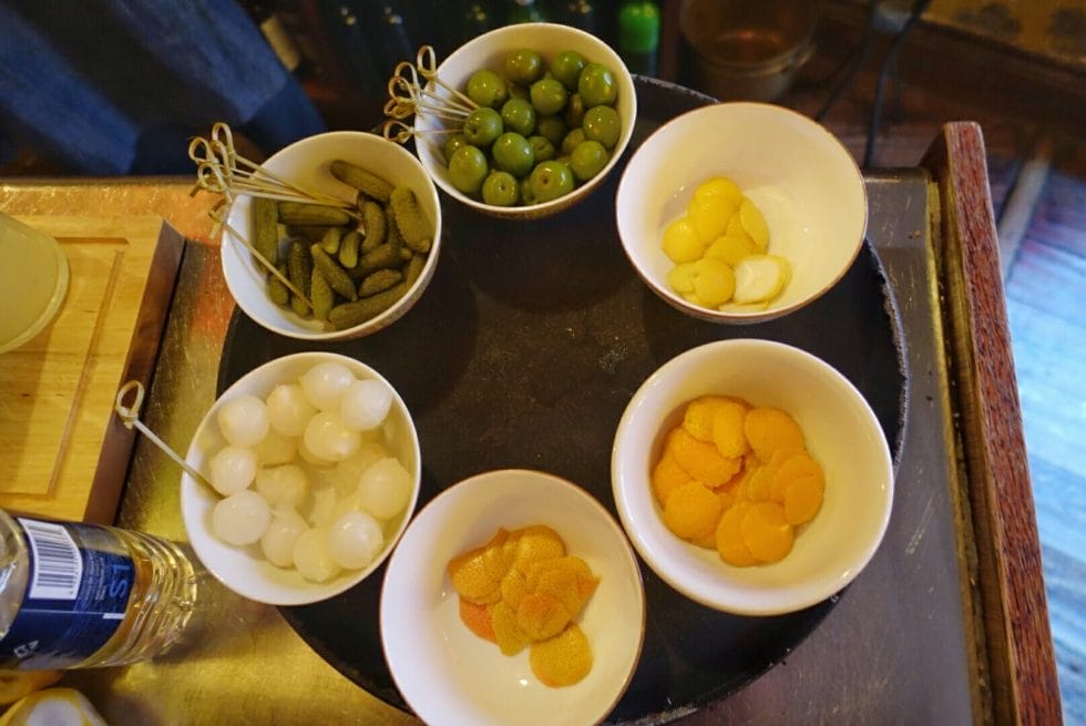Bowls of the citrus and savoury martini garnishes