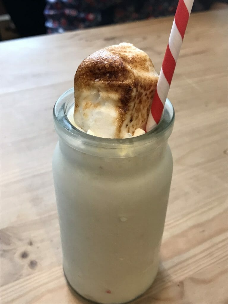 Ice cream shake topped with toasted gin and tonic marshmallow