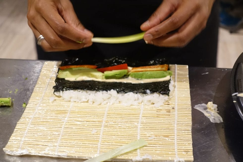 Adding the final fillings before rolling up