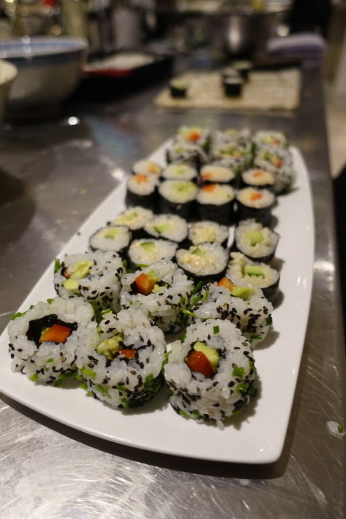 A plate of finished sushi rolls