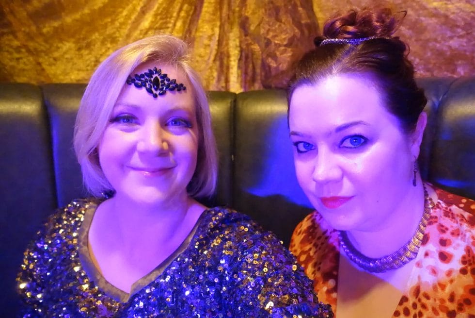 Katie with glitter and sequins and Becky with a classical Goddess look