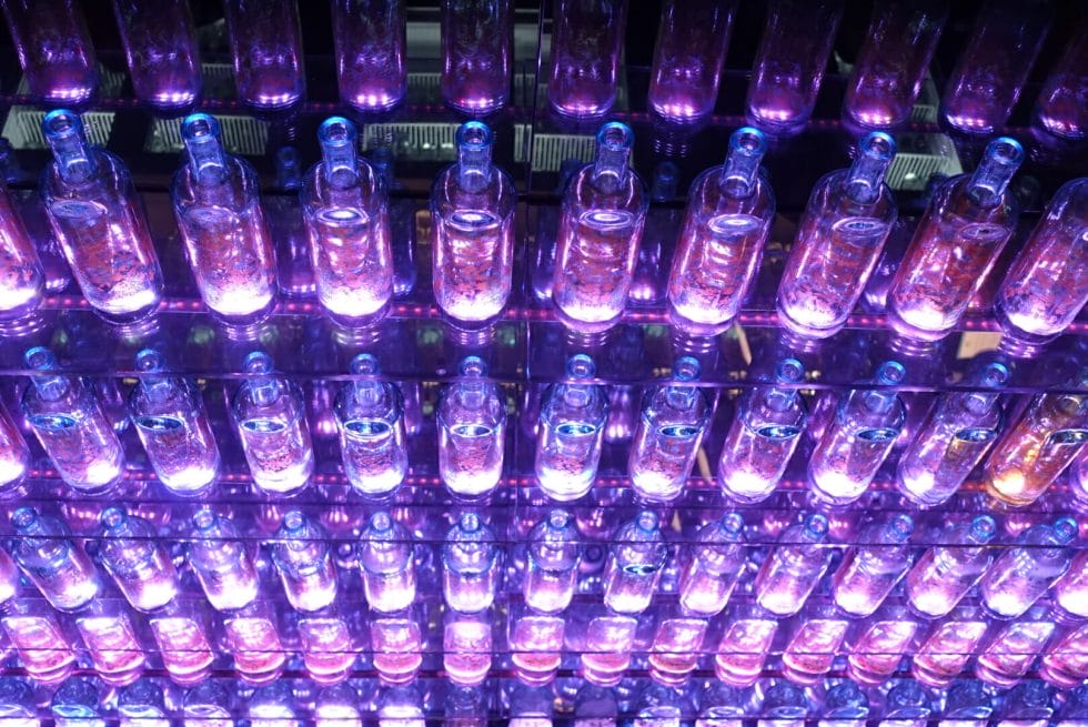 Silent Pool bottles as lights above the bar