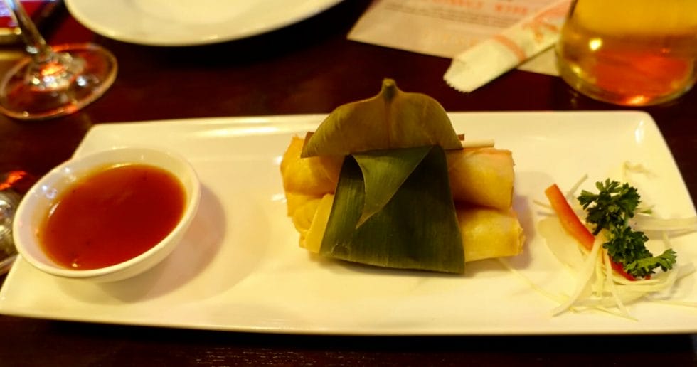Veggie spring rolls wrapped in a banana leaf 