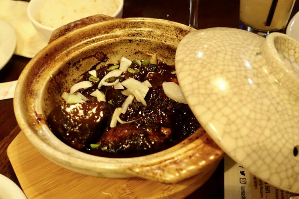Aubergine hot pot with lid on the side