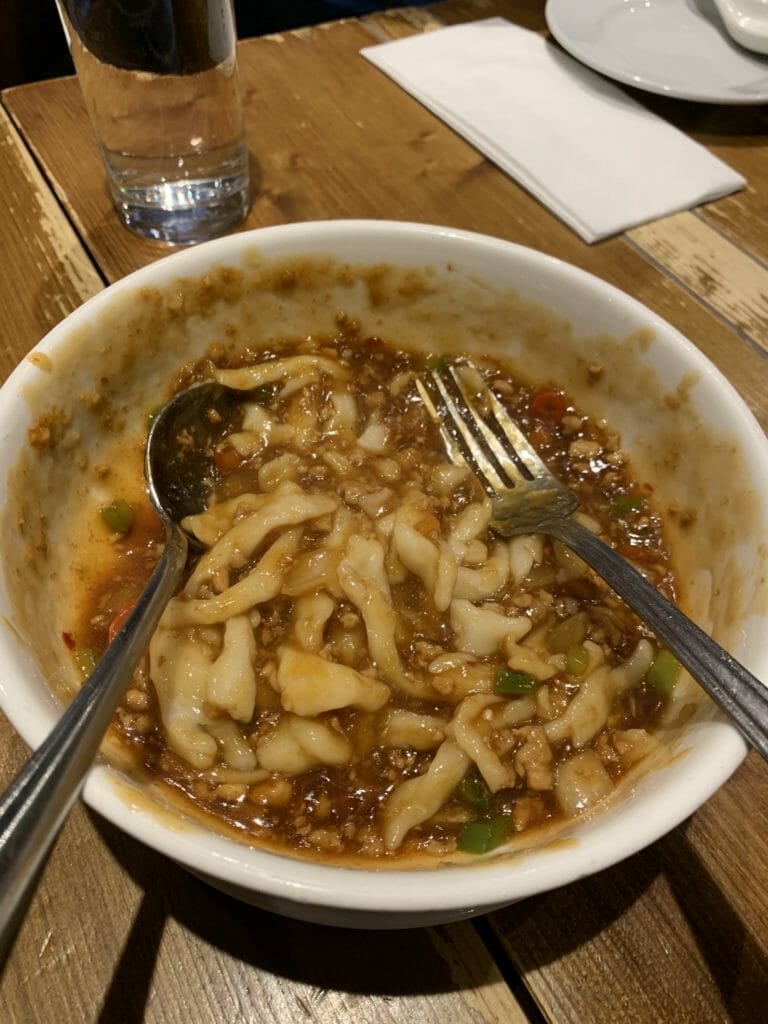 Hand made noodles mixed with pork sauce