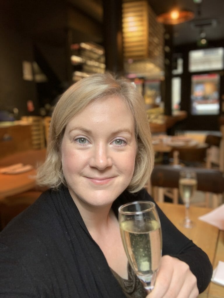 Katie with a glass of cava