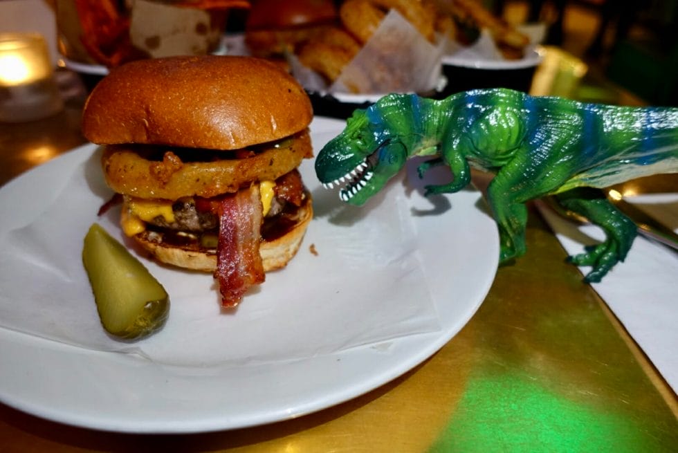 T-Rex next to the substantial B-Rex Burger