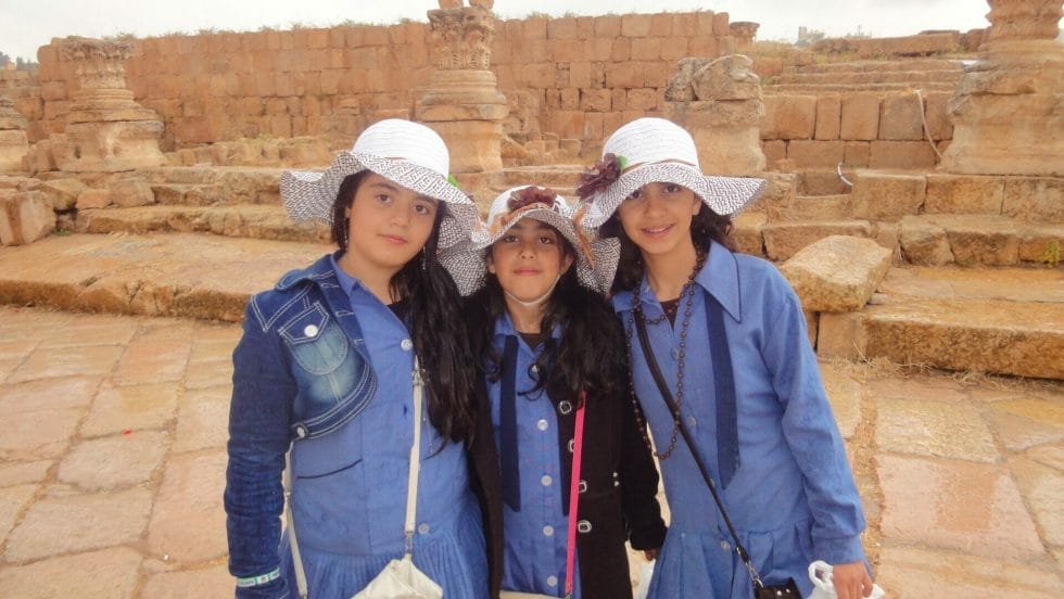 Jordanian girls with cute sun hats at Jerash