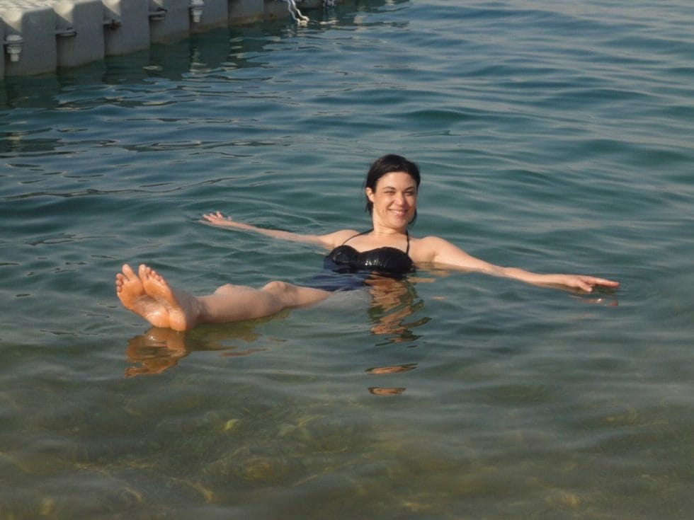Katies friend floating in the Dead Sea
