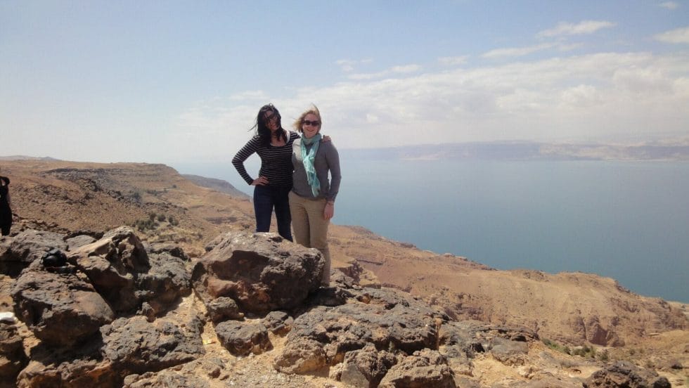Katie and friend with the Dead Sea in the background