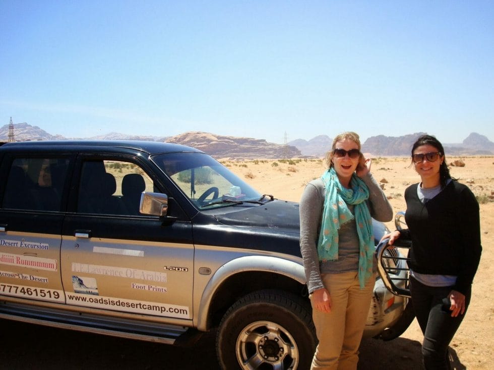 Katie and friend with the truck in Wadi Rum