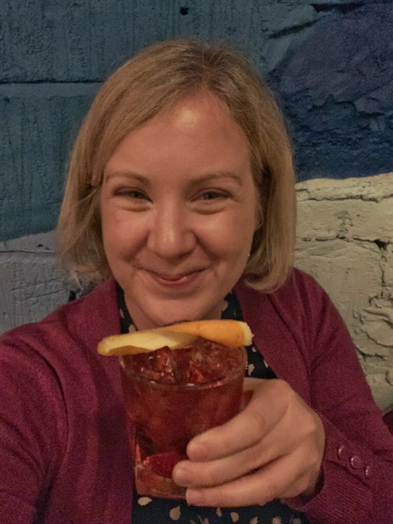 Selfie of Katie with her favourite negroni cocktail