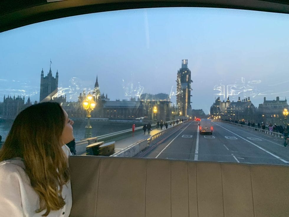 Beth looking across Westminster bridge to the Houses of Parliament