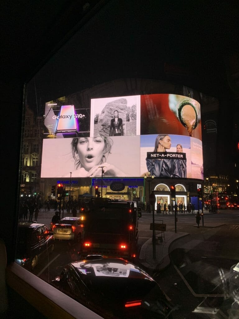 Piccadily Circus lit up at night - another iconic London sight