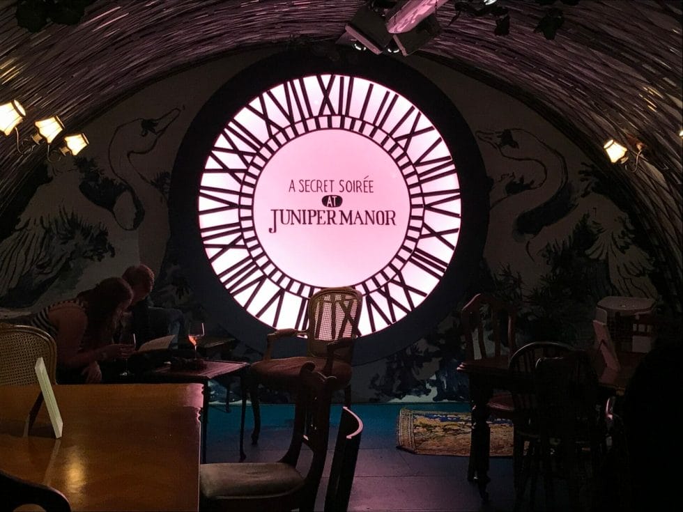 The Juniper Manor bar area with clock shaped light