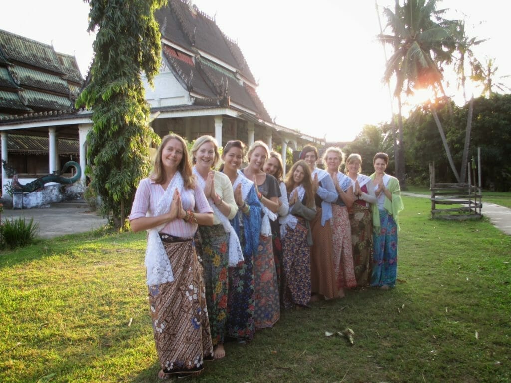 Katie and friends in traditional dress in Laos with Stray