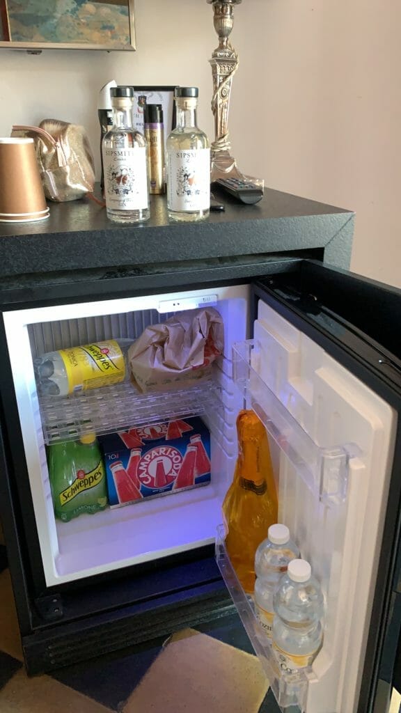 The mini fridge stocked with our drinks!