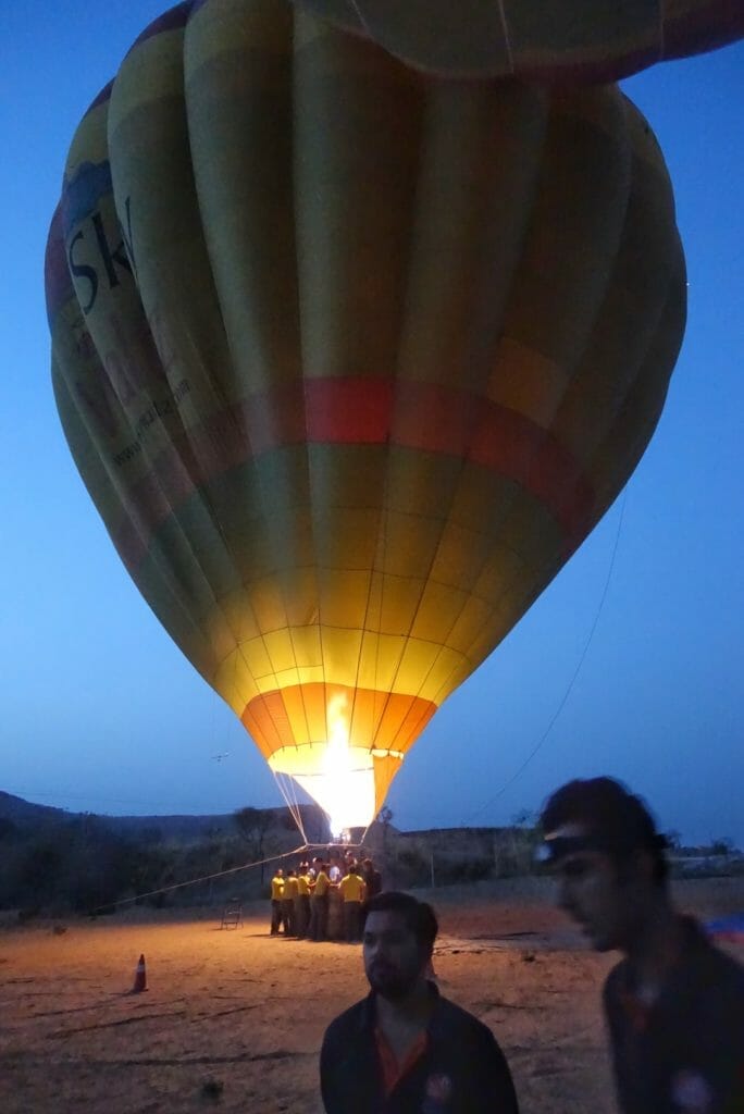 Hot air balloon in the pre-dawn light with the burners going
