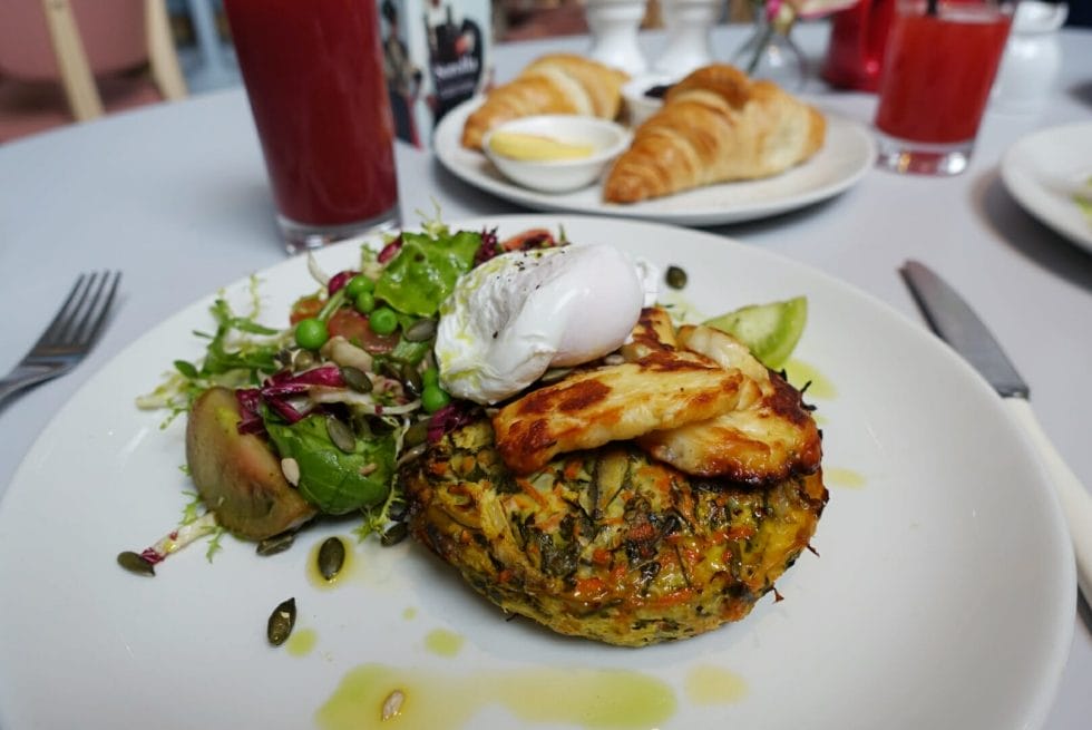 Summer courgette fritter with poached egg & halloumi