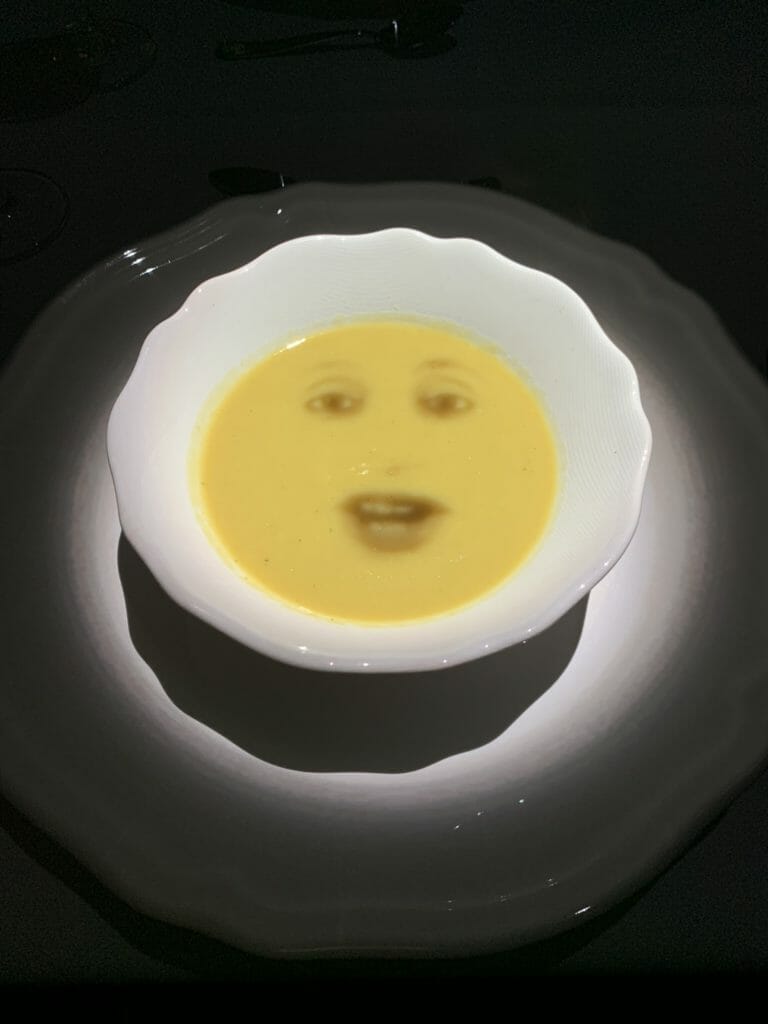 Soup bowl with a face projected on it