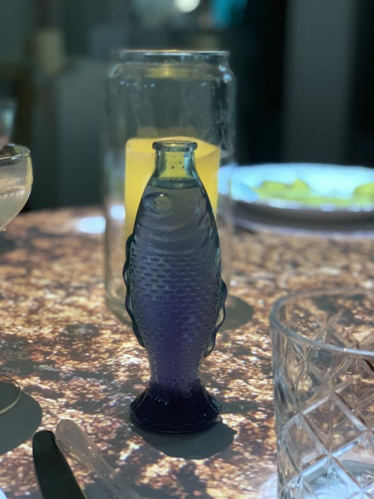 Blue drink in a fish shaped bottle