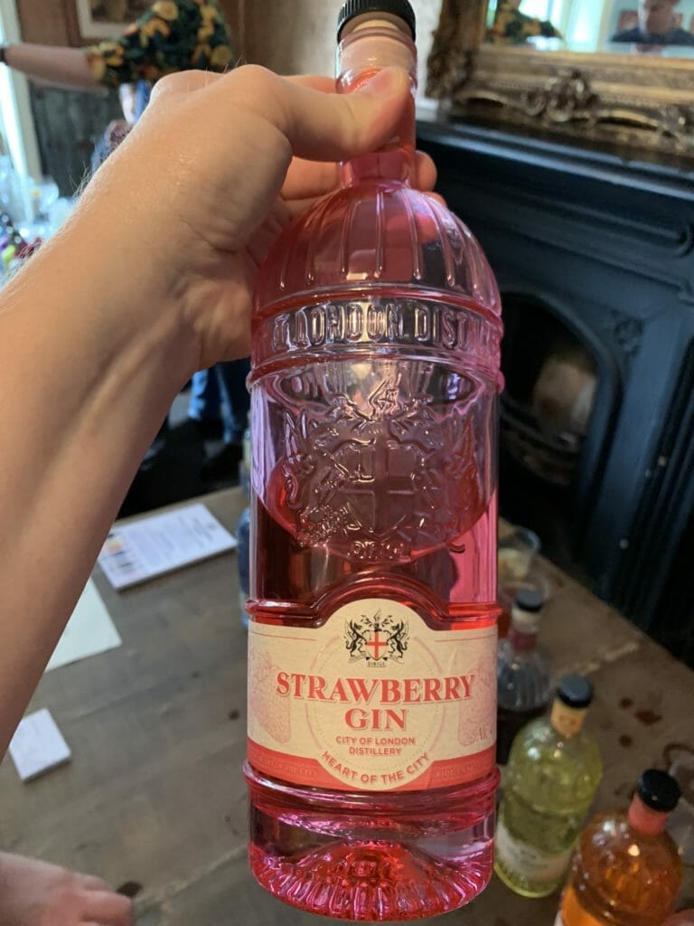 Strawberry gin in it's dark pink bottle
