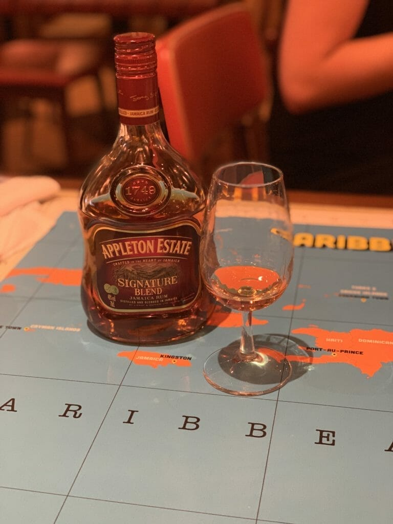 Appleton Estate rum bottle on Caribbean map