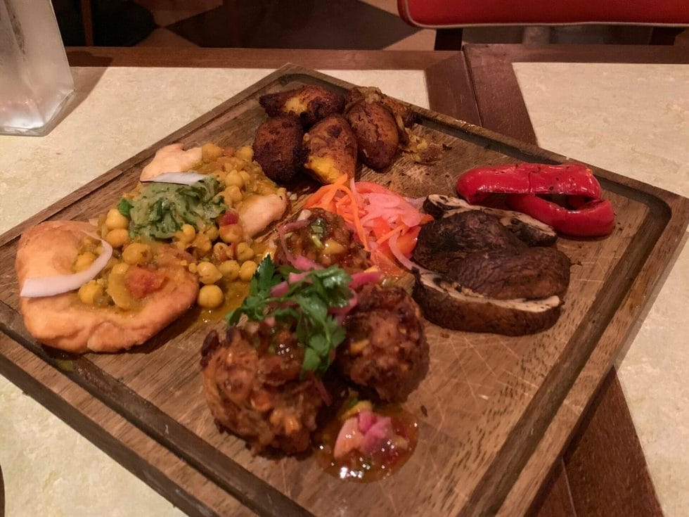 Wooden platter of vegan foodies