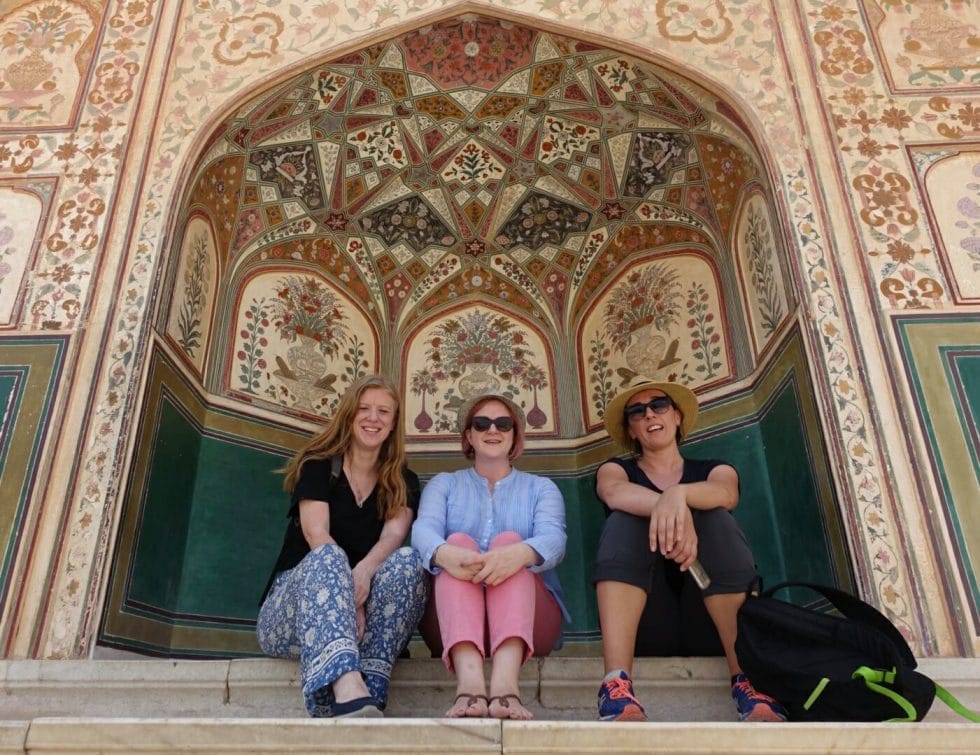 The girls posing in a niche at the Amer Fort in Jaipur