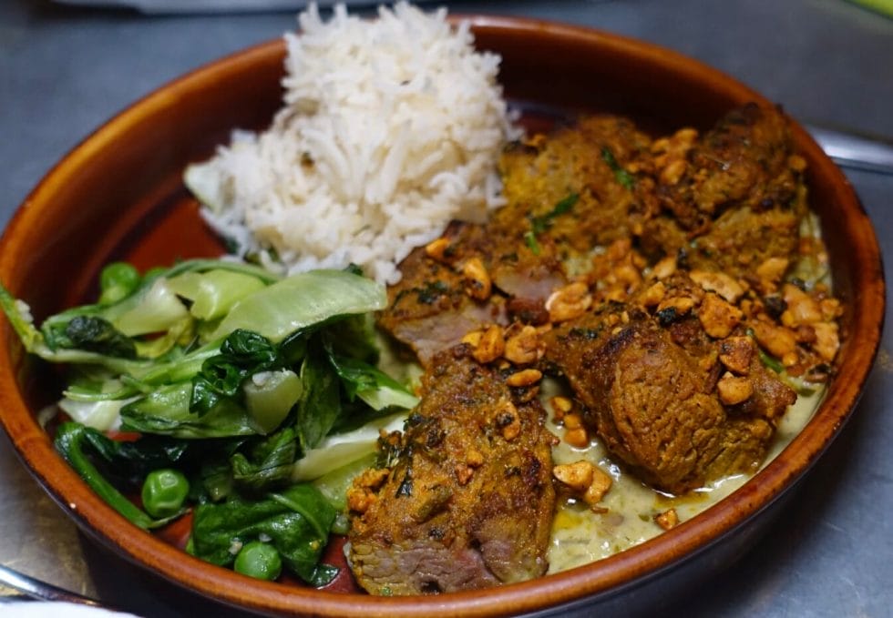 Lamb with greens and pilau rice