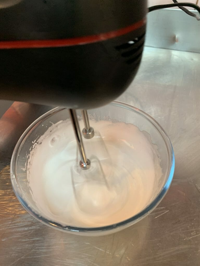Finishing off the whisking with a machine