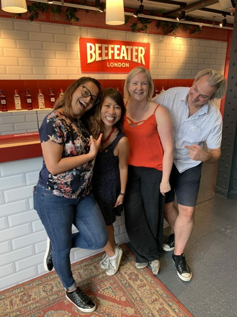 Katie and her gin friends in front of the Beefeater gin bar at the distillery