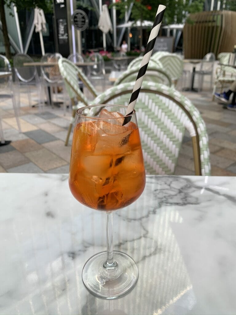 Aperol spritz outside on a restaurant table