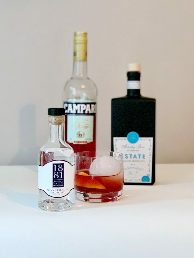 1881 Navy Strength negroni with ingredient bottles