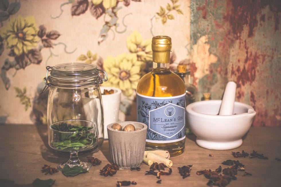 McLean's signature gin surrounded by botanicals