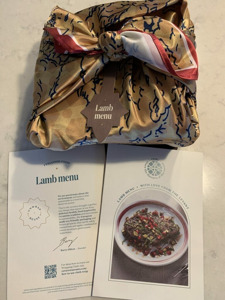 Lamb box wrapped in printed scarf with instructions