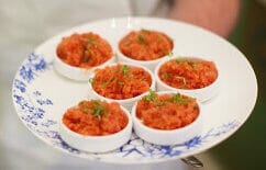 6 dishes of bloody mary granita on a plate