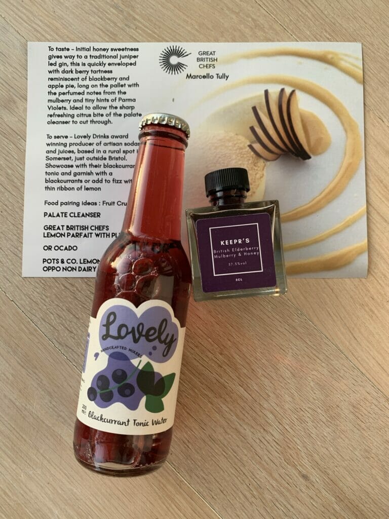 Keepr's elderberry & mulberry honey gin with blackcurrant tonic water on the info card