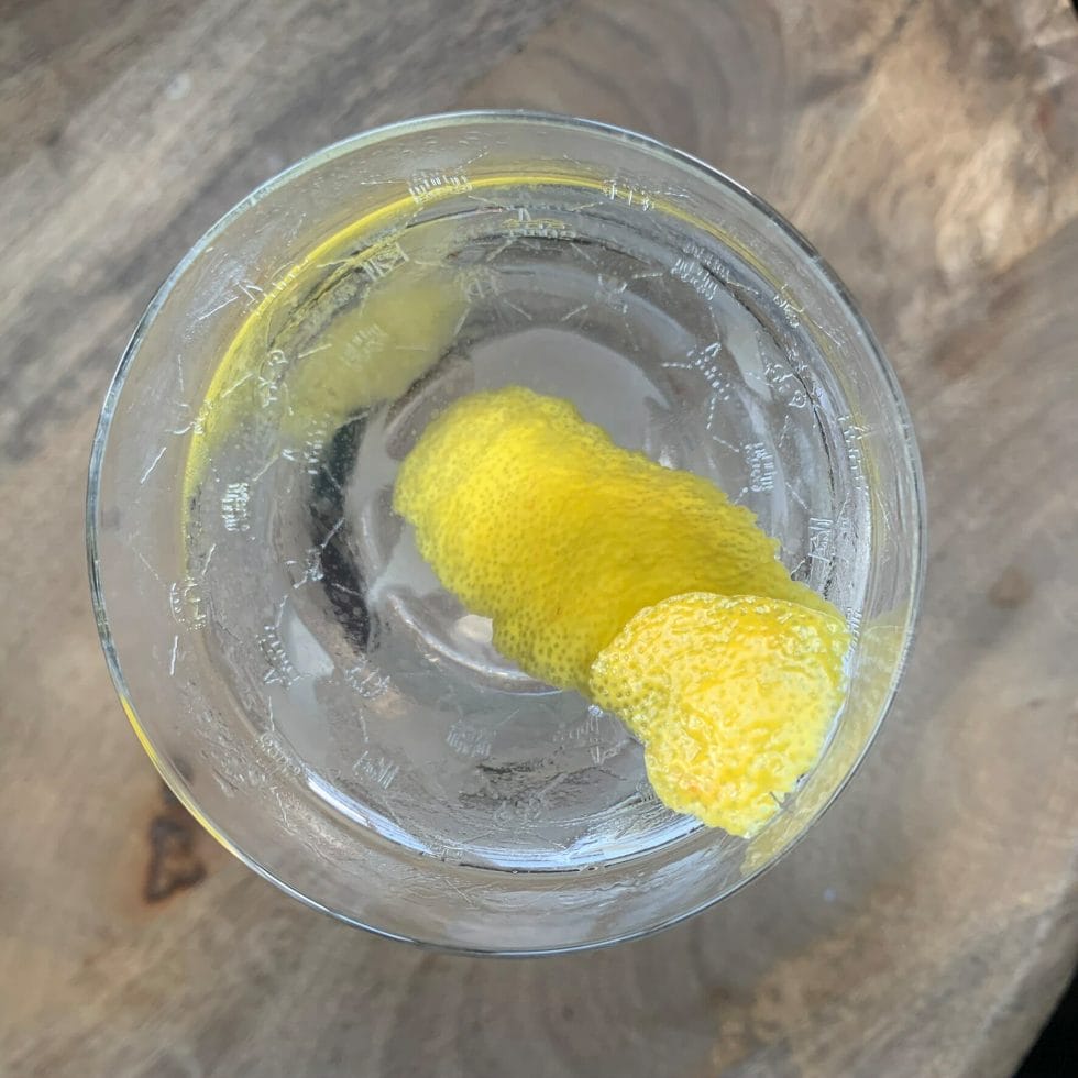 Plymouth martini in their specially designed glass, with lemon peel