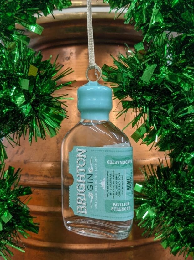 Brighton gin mini surrounded by green tinsel