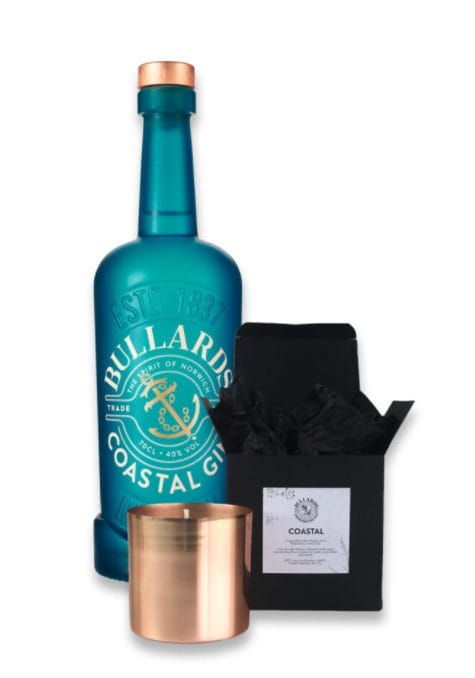 Bottle of Bullards gin and candle in metallic holder