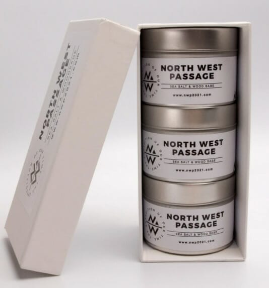 3 North West Passage candles stacked in a box