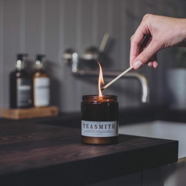 Teasmith candle being lit