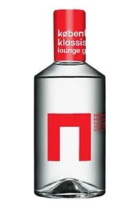 Clear gin bottle with red labelling against a white background
